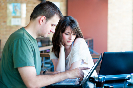 Couple taking surveys online